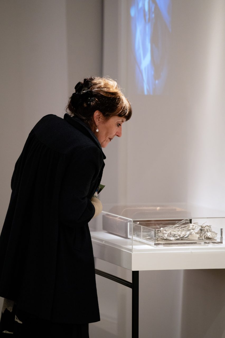 Visitor watching Ides of Utopia