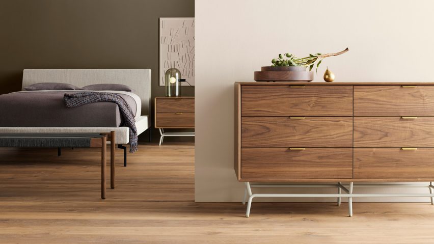 Grey and wood Invitation bench by Blu Dot in front of a bed