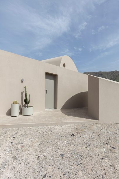 Image of the cement clad exterior of Monolithus