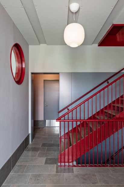 A staircase was painted a deep red