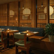 Wooden dowel screen divides Lonely Mouth restaurant