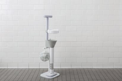 Grey and white prosthetic leg Lytra in its stand