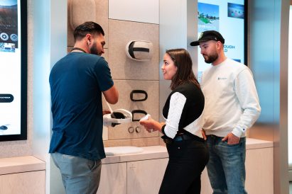 Meta customers trying out products in Meta Store