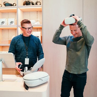 A customer trying a Meta headset