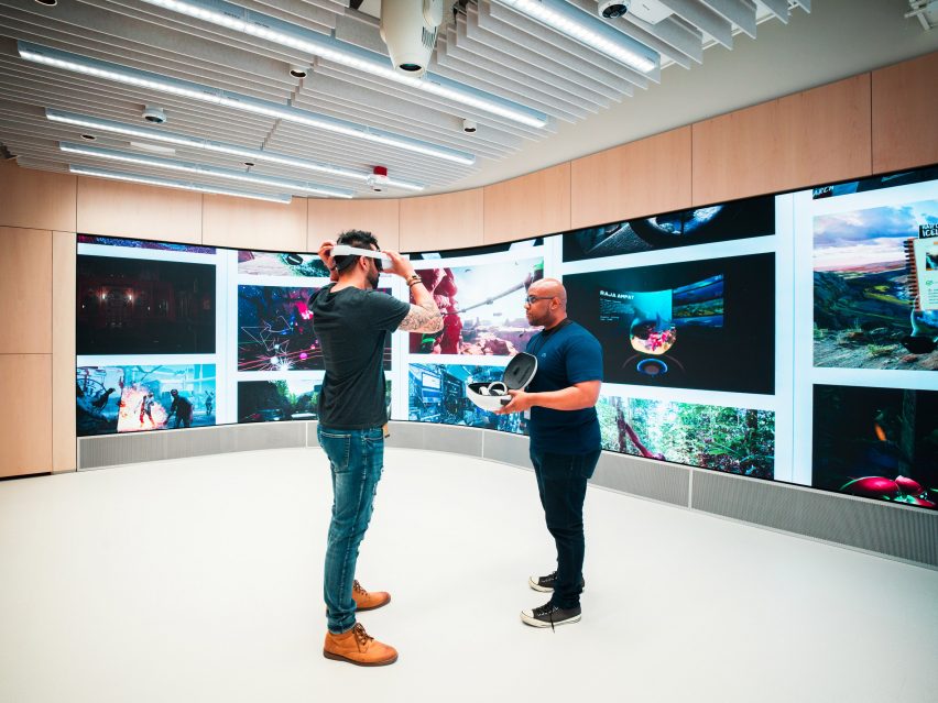 Two men trying out a virtual reality headset