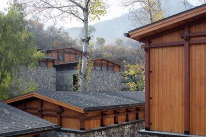 Image of the roofline at In S&N Resort against the mountain