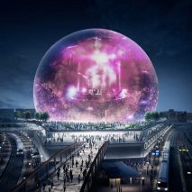 Populous' spherical music venue lit up at night