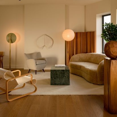 The living room interiors of Amity Street Residence apartment