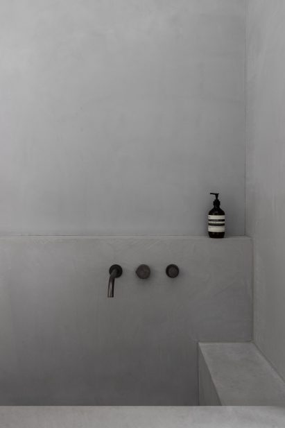 Concrete tub in bathroom interior of Ripponlea House
