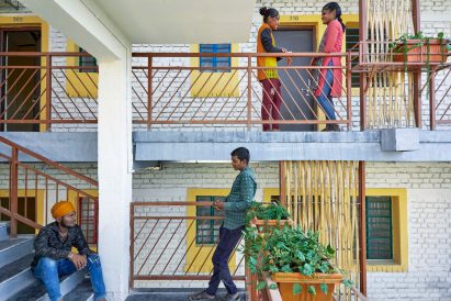 Residents in the Sanjaynagar slum