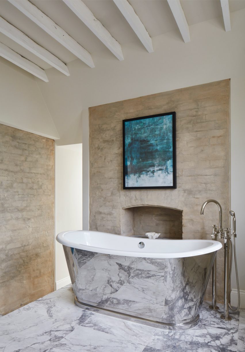 Bathroom with exposed brick walls