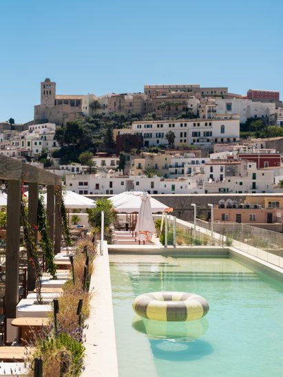 Image of the roof top pool overlooking the town