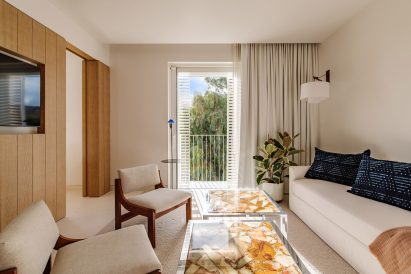 Interior image of a bedroom suites seating area at the hotel