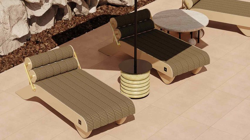 Two Tropez Daybed by Hommés Studio in fern fabric ourdoors under a sun umbrella