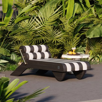 Black and white striped Tropez Daybed outdoors amongst greenery