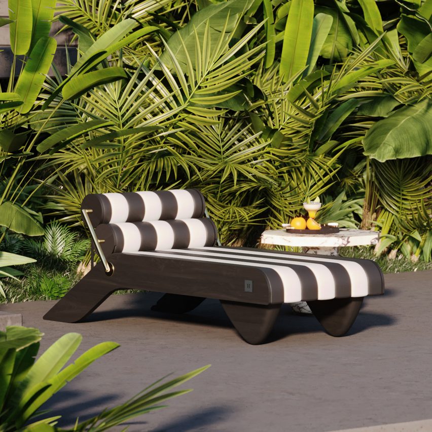 Black and white striped Tropez Daybed outdoors amongst greenery