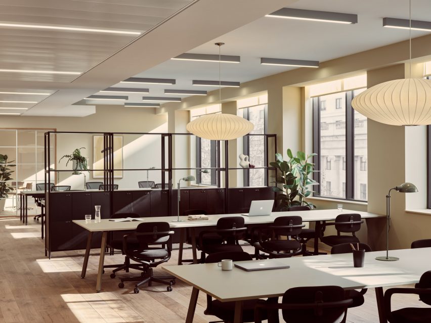 A workspace with rice lamps and black chairs
