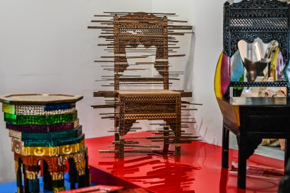 A photograph of a wooden chair sculpture