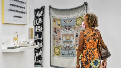 A person looking at contemporary designs as part of Dubai Design Week