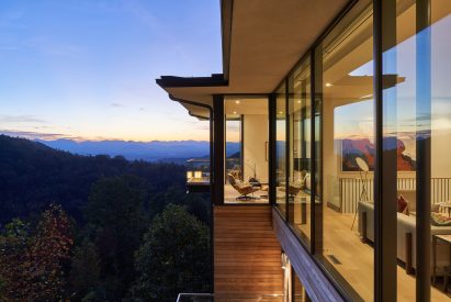 Glazing with Eames chair and Ashville in distance