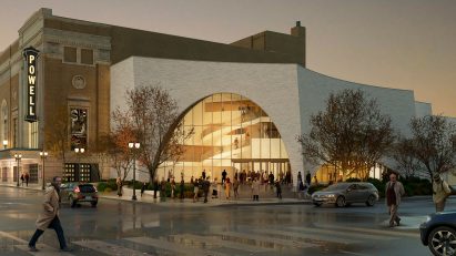 orchestra modern expansion with arch and glass next to marquee