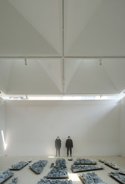 White-walled art gallery by ASA North