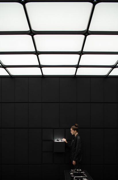 Woman looking at illuminated drawer in KVK jewellery store