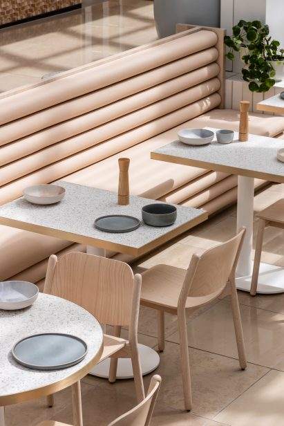 Flesh coloured bench seating in Au79 cafe