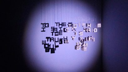 Hanging letters on a purple spotlight by bachelor of design student at Monash University