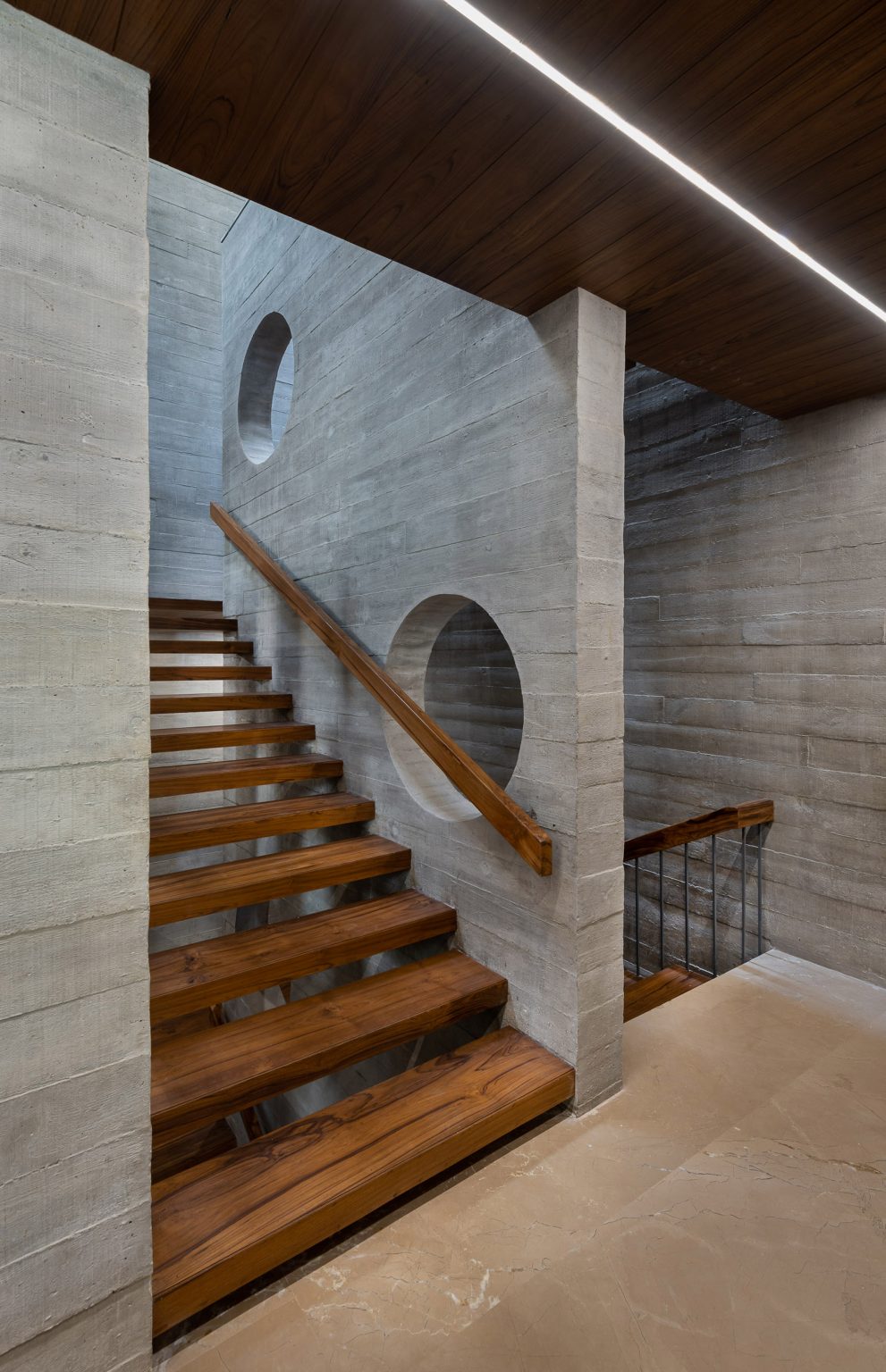 Beton Brut is a concrete home that was designed by The Grid Architects