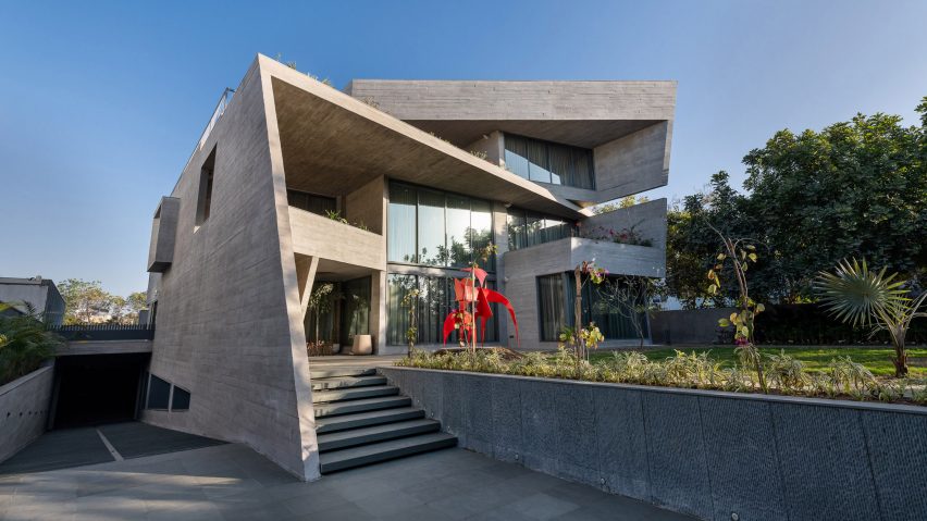 Exterior image of the concrete home from street level