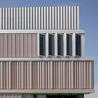 Folding aluminium covers the exterior of the building