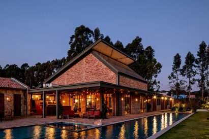 Brick and stone house by Estúdio Penha