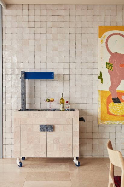 Bar cart with lapis lazuli details in dining room of Dream Weaver penthouse