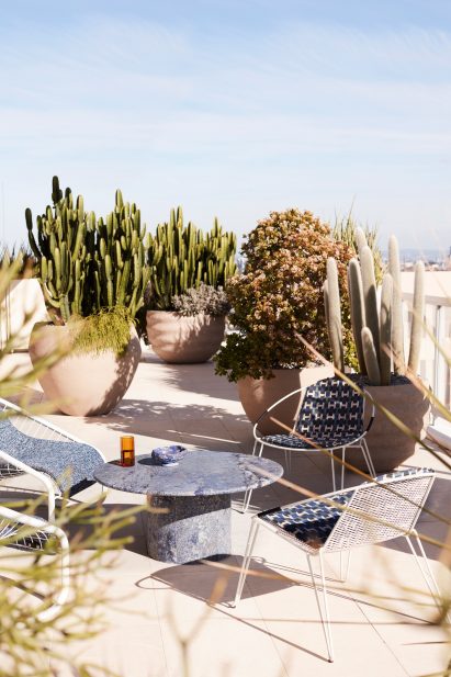 Terrace of Dream Weaver penthouse with blue outdoor furnishings