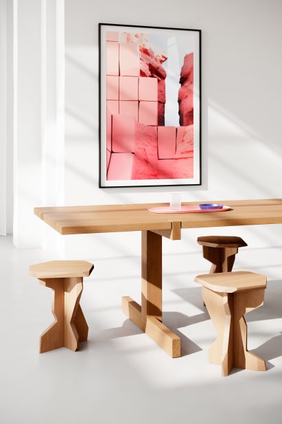 Three wooden Fels stolls by OUT around a wooden table
