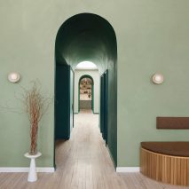 A green archway at Moxi wellness studio