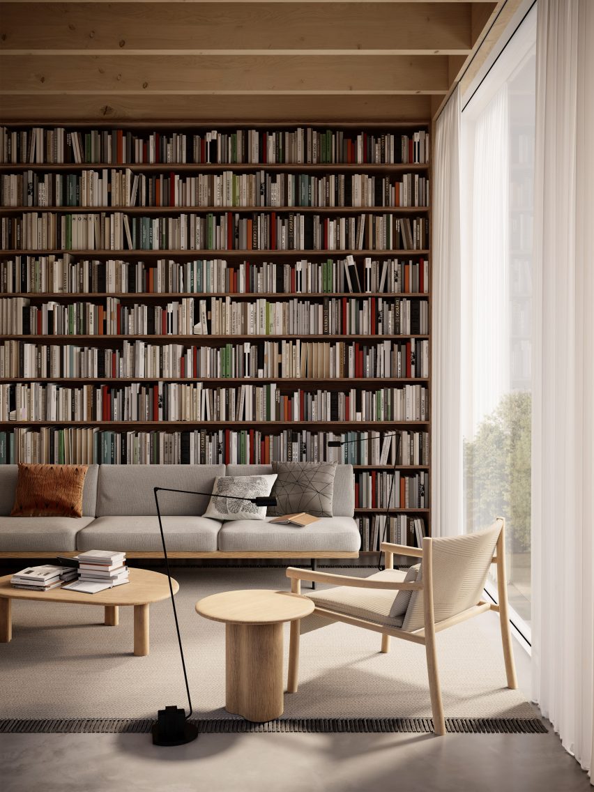Photograph showing a bookshelf-lined room with seating and large and small Ghia tables in natural wood