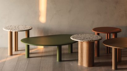 Photograph showing range of Ghia tables with coloured and patterned surfaces