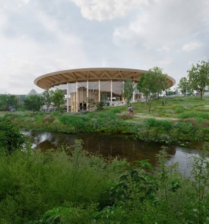 Render of World of Volvo appearing amongst green plants and landscaping