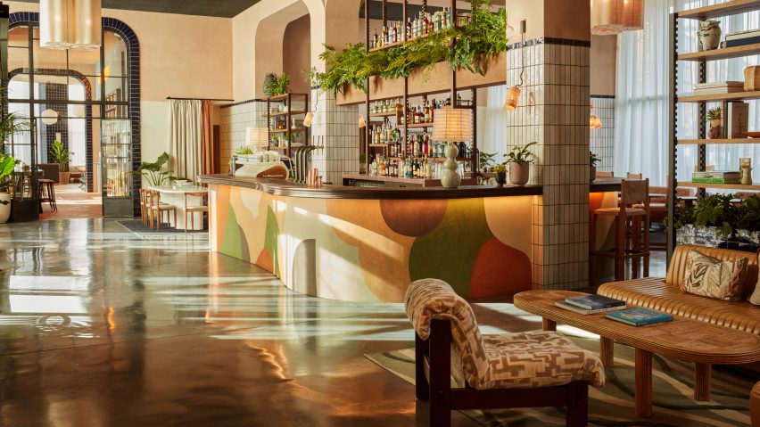 A hotel lobby with a colourful serving counter