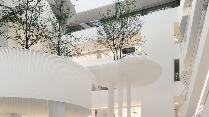 Platforms with trees and waterfalls in Hyundai Seoul mall by Burdifilek