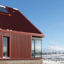 Ceangal House has a brick and metal exterior