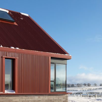 Ceangal House has a brick and metal exterior