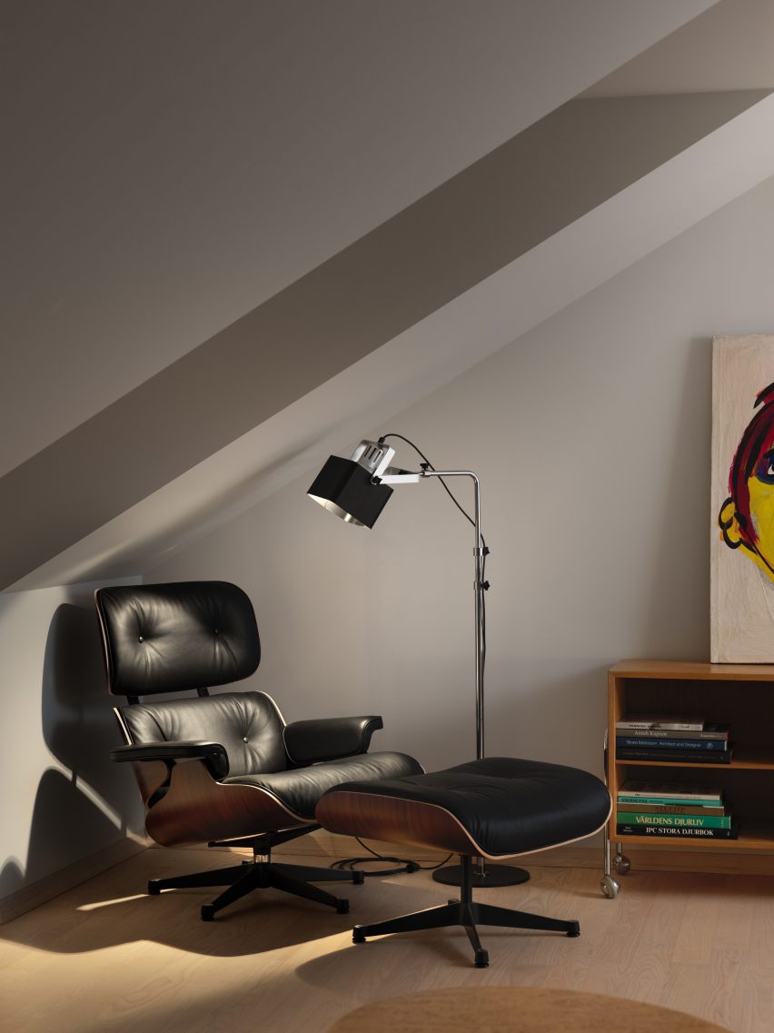 Luminaires Series 100 floor lamp next to a mid century chair