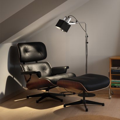 Luminaires Series 100 floor lamp next to a mid century chair