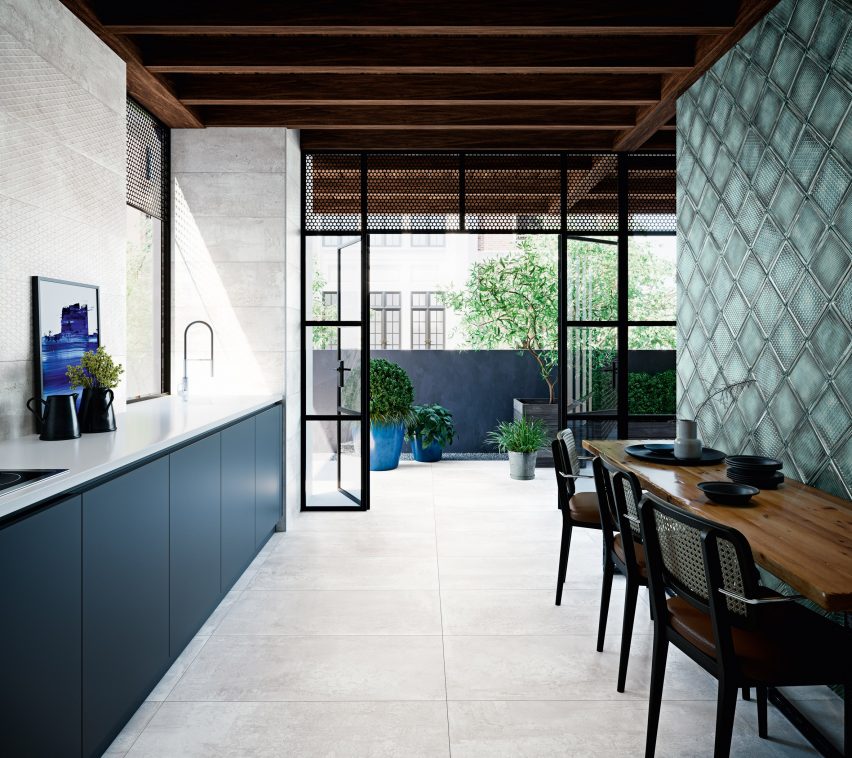 Grey-coloured Metallic tiles by Aparici in a residential kitchen