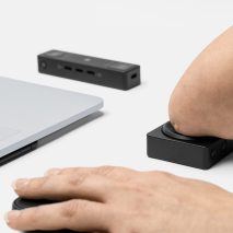 A disabled person using laptop accesories