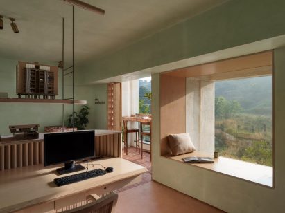 Office area with window seat in Mind Manifestation's self-designed studio