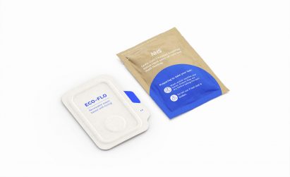 Rendering of the Eco-Flo pulp paper covid-19 test next to its biodegradable film sachet packaging